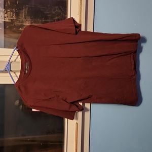 Believe it was from the male section. Maroon tshirt. No damage, or stains.